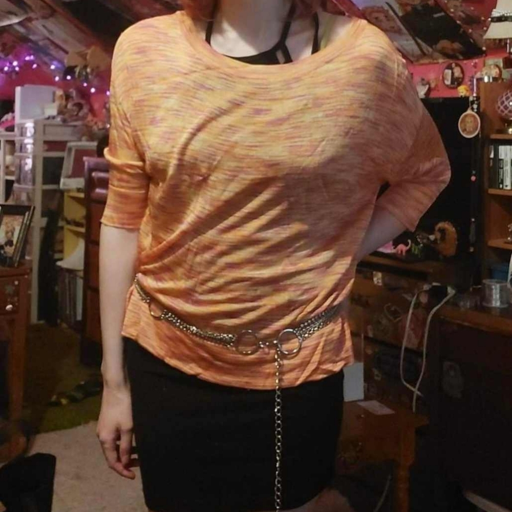 Jennifer Lopez orange heather mesh top